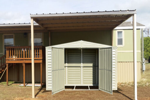 Duramax Shed Placed Near Home With Open Doors 1