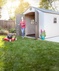 Lifetime 8x15 Outdoor Storage Shed 60075 woman pushing a lawnmower