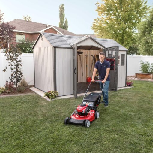Lifetime 12.5 Ft. X 8 Ft. Outdoor Storage Shed 60223 man mowing