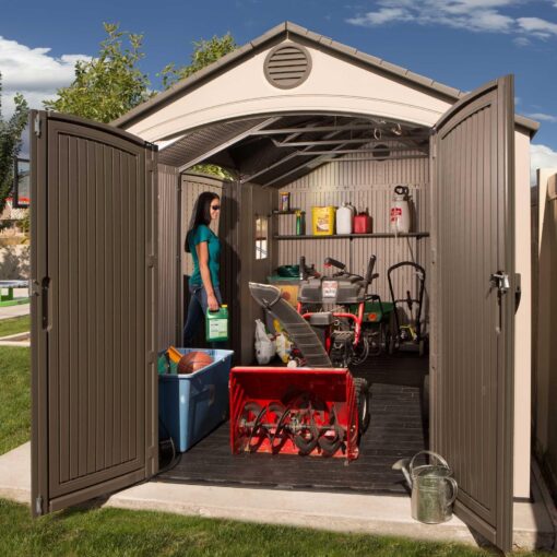 Lifetime 15 Ft. x 8 Ft. Outdoor Storage Shed 60079 with woman inside