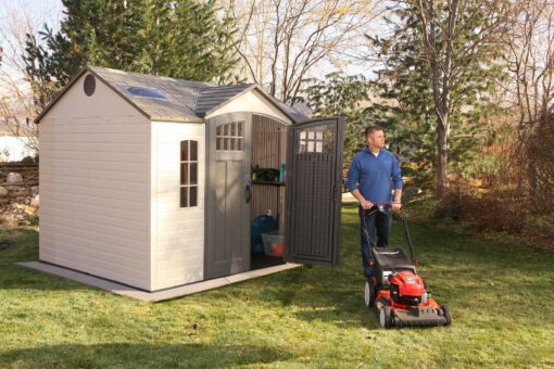 Lifetime Outdoor Storage Shed 60178 in use with lawn mower
