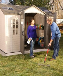 Lifetime Outdoor Storage Shed 60178 side view with family activity