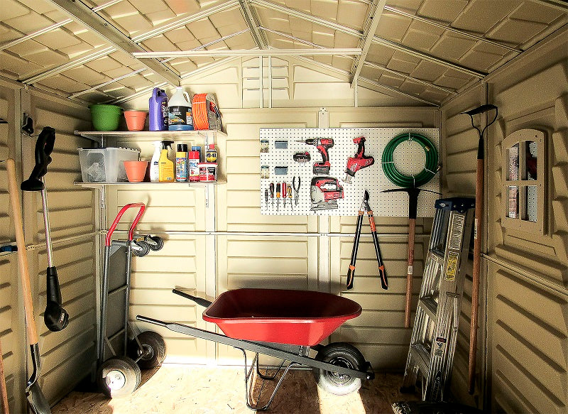 Interior view of Duramax DuraPlus 8x8 shed, showcasing storage solutions and organized tools.